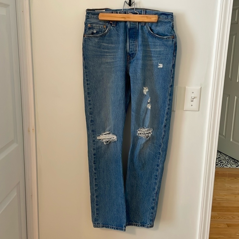 Levi’s 501 ripped straight leg jeans